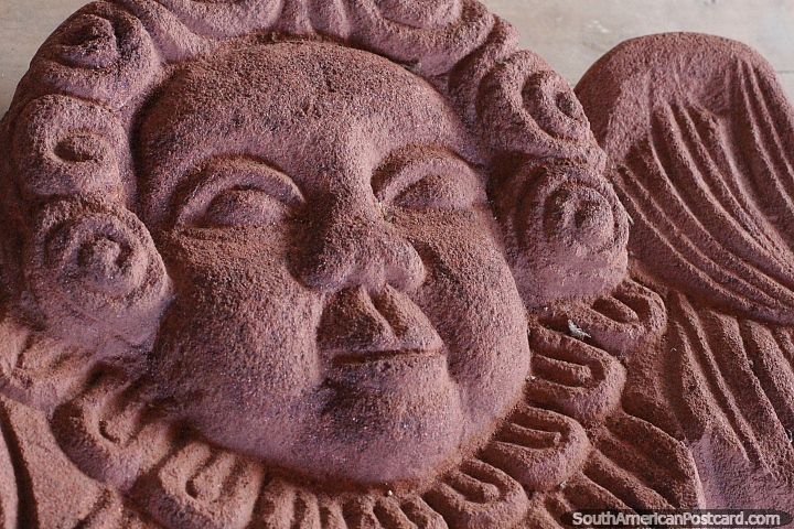 Detailed ceramic work of a face outside the museum in San Ignacio Guazu. (720x480px). Paraguay, South America.