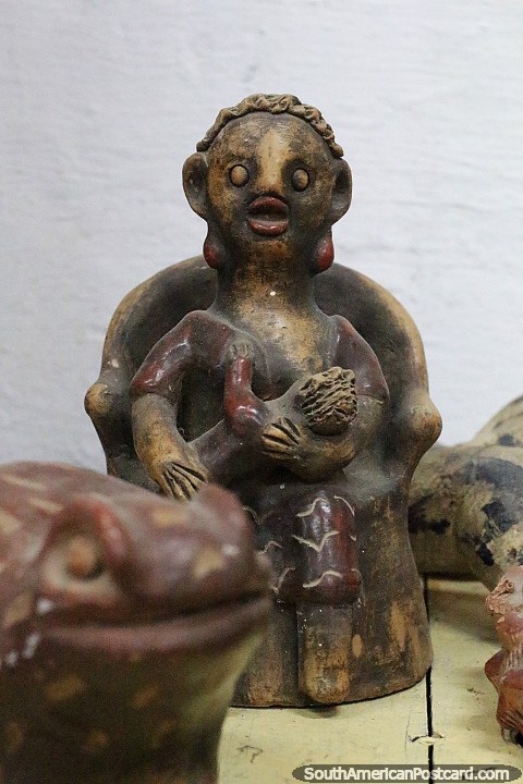 Antique ceramic figure at the Historic Cultural Museum in Villeta. (480x720px). Paraguay, South America.