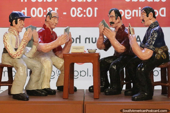 Ceramic work of 4 men playing cards at the cultural center in Aregua. (720x480px). Paraguay, South America.