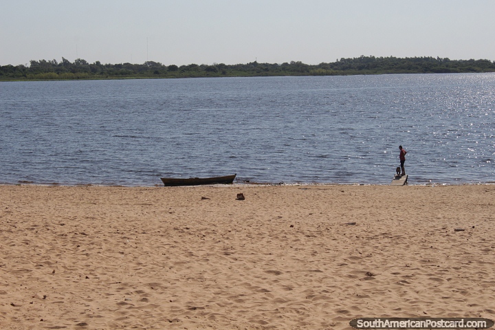 View from the beach across the bay to the ecological reserve in Asuncion. (720x480px). Paraguay, South America.