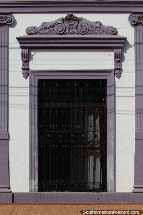Nice decoration in purple ceramic of a building in Concepcion. (480x720px). Paraguay, South America.