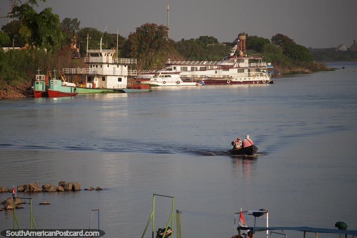 Tugboat and passenger boats at the port in Concepcion. (720x480px). Paraguay, South America.