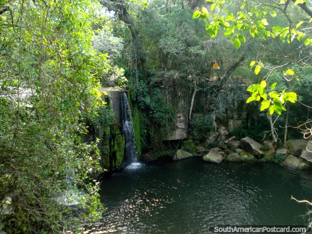 View of waterfall and pond from above at Ybycui National Park. (640x480px). Paraguay, South America.