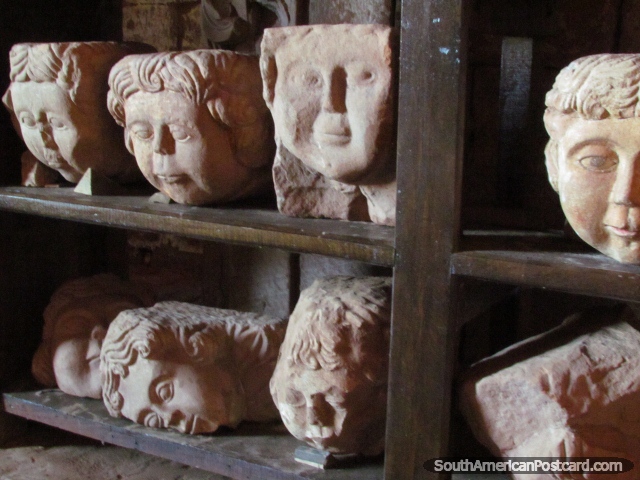 Shelf of angels heads that came from the church archways of Trinidad's ruins. (640x480px). Paraguay, South America.