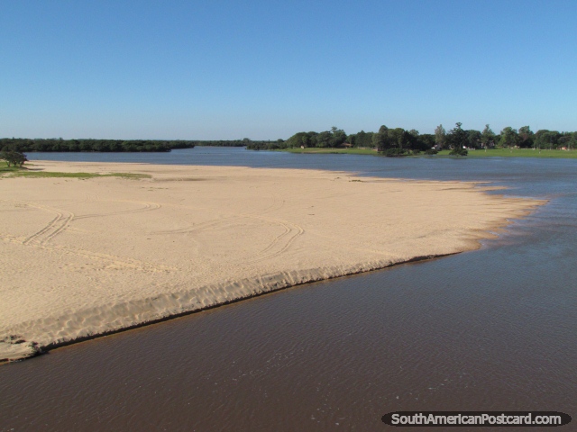 A beautiful white sandy beach on the Tebicuary River in Villa Florida. (640x480px). Paraguay, South America.