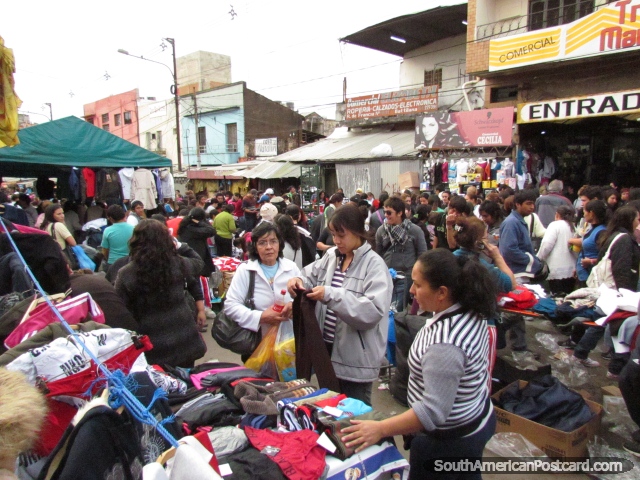 Women shopping for discounted clothes at Guasu Markets in Asuncion. (640x480px). Paraguay, South America.