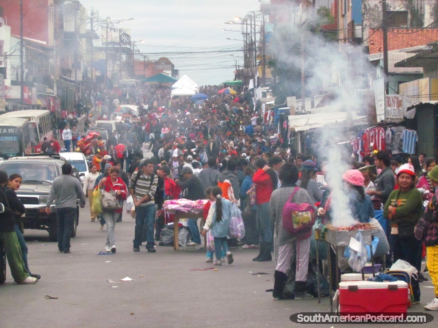 Guasu Markets in Asuncion, a long crowded street full of activity and bargains. (640x480px). Paraguay, South America.
