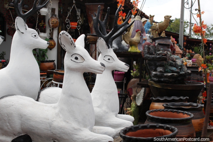 3 white ceramic reindeer, for sale in Aregua, the capital of ceramics. (720x480px). Paraguay, South America.