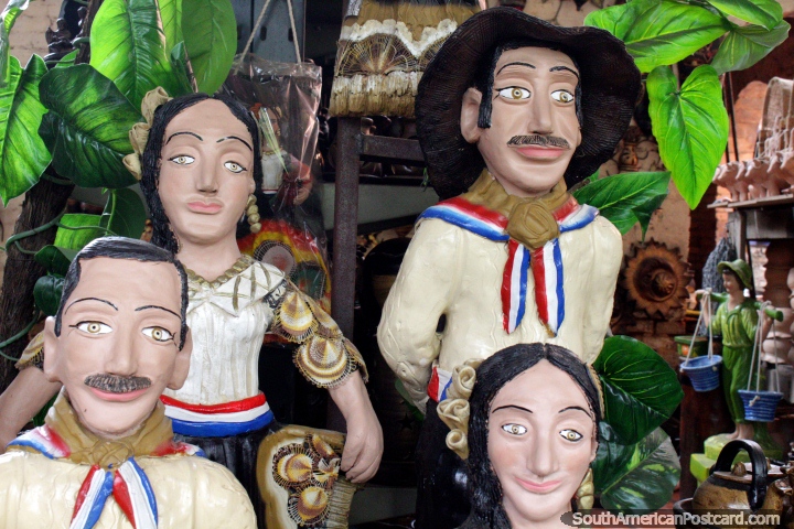 Group of 4 ceramic figures in traditional clothes, ceramics from Aregua. (720x480px). Paraguay, South America.