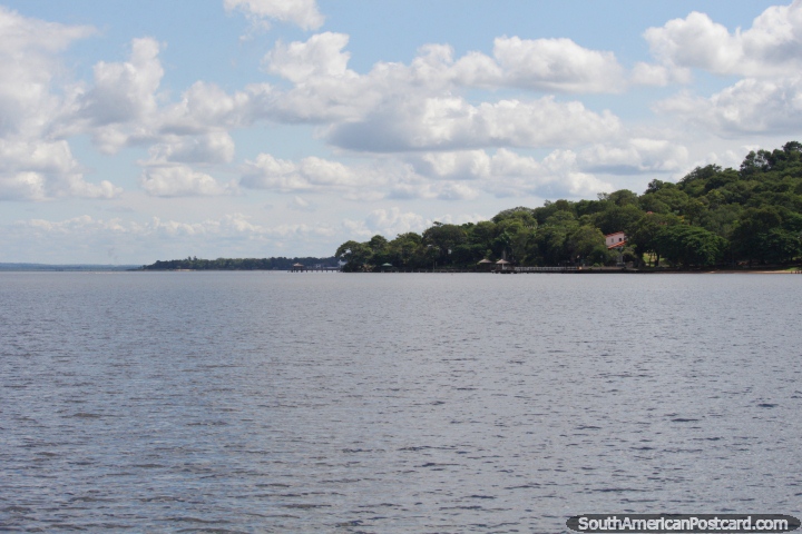 Cruising on a boat around Lake Ypacarai, enjoying the scenery and open waters. (720x480px). Paraguay, South America.