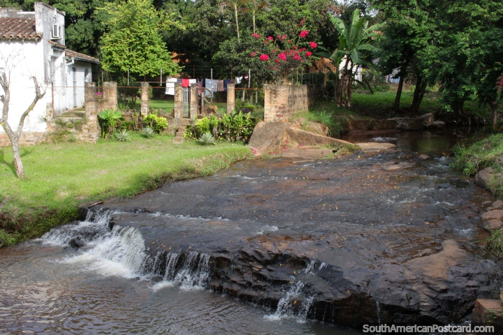 This scenic river runs through Caacupe beside Plaza Heroes del Chaco. (720x480px). Paraguay, South America.