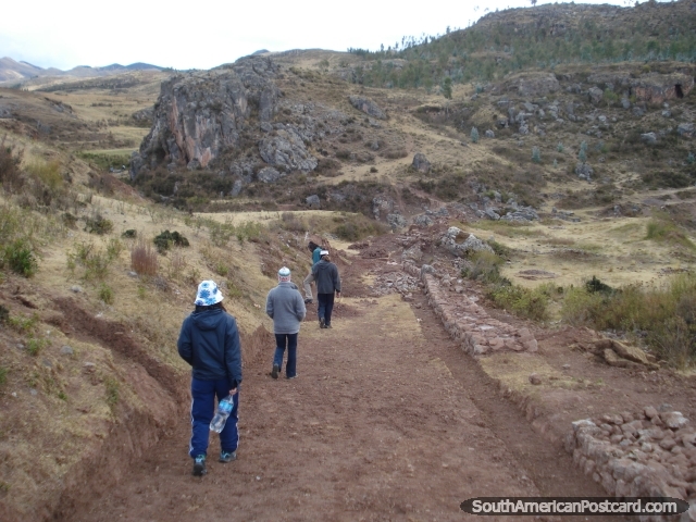 A group walking in the hills that overlook Cusco. (640x480px). Peru, South America.