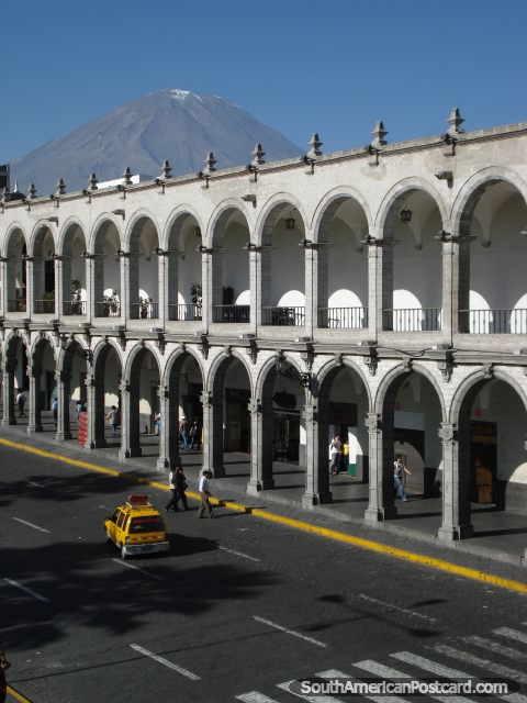 A plaza of archways and mountain views in Arequipa. (480x640px). Peru, South America.