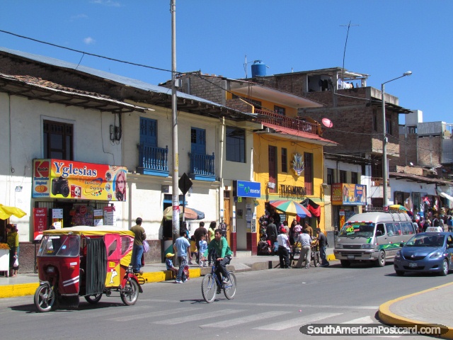 Busy road with markets and shops in Cajamarca. (640x480px). Peru, South America.