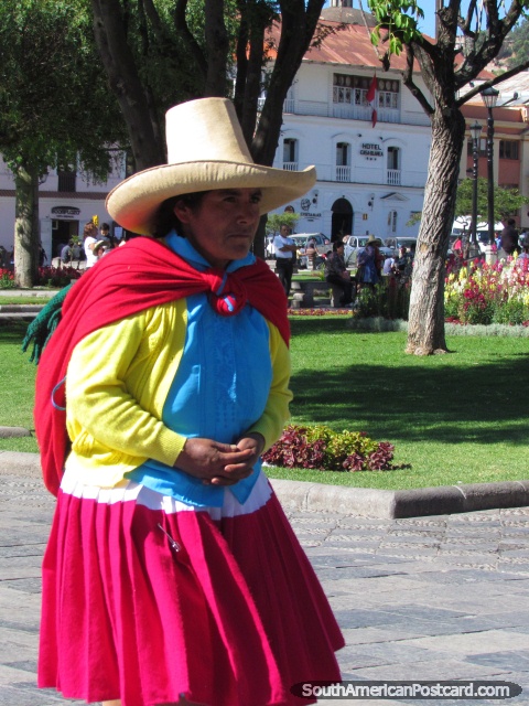 Indigenous woman in bright colored clothes in Cajamarca. (480x640px). Peru, South America.