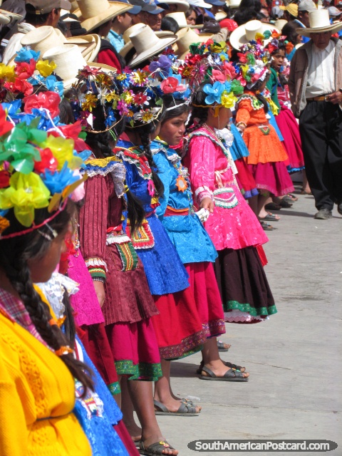 A colorful site of costumes and head gear at Feria Patronal in Huamachuco.. (480x640px). Peru, South America.