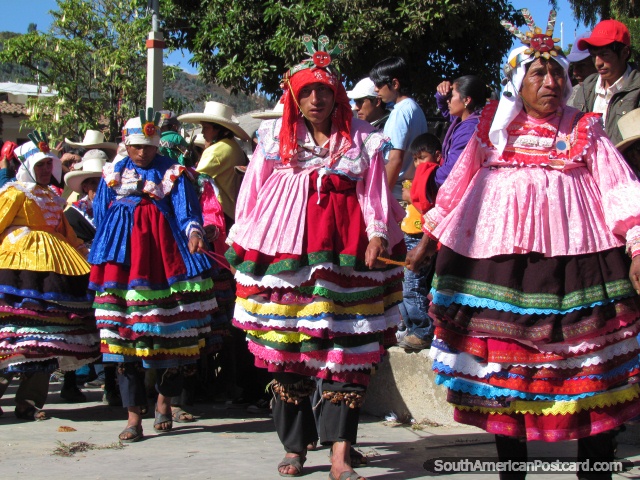 Lines of Peruvian Indians in costume hold string in Huamachuco. (640x480px). Peru, South America.
