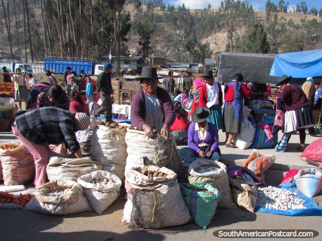 Quechua indigenous people selling produce at Andahuaylas markets. (640x480px). Peru, South America.