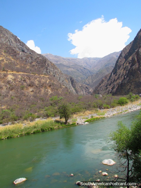 Turquoise river waters and rocky hills between Abancay and Cusco. (480x640px). Peru, South America.