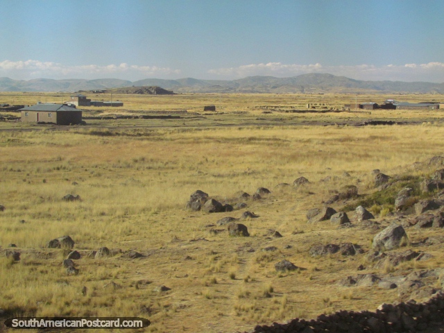 Rocky farmland and hills near Paucarcolla. (640x480px). Peru, South America.