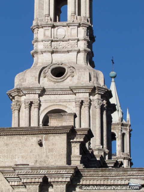Designs in stone of the church steeples around the plaza in Arequipa. (480x640px). Peru, South America.