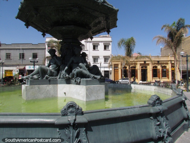 Fountain at the plaza in Tacna, looking across the street. (640x480px). Peru, South America.
