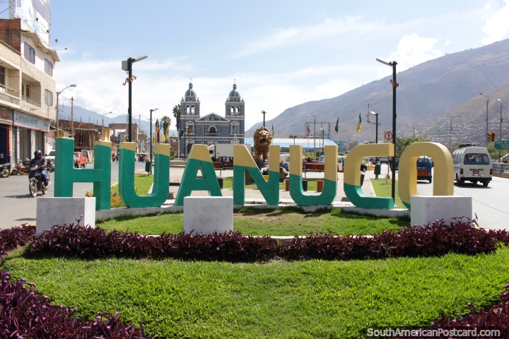 Huanuco, the lion monument and church, welcome! (720x480px). Peru, South America.