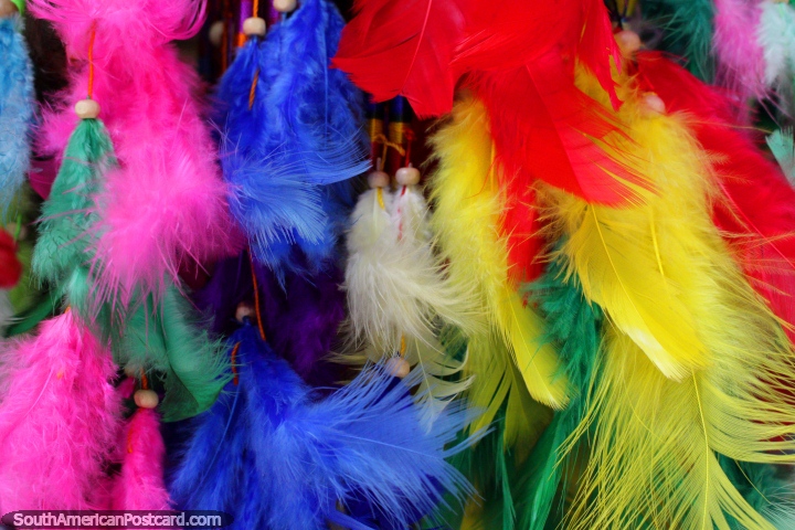More brightly colored feathers, arts and crafts of Tingo Maria. (720x480px). Peru, South America.