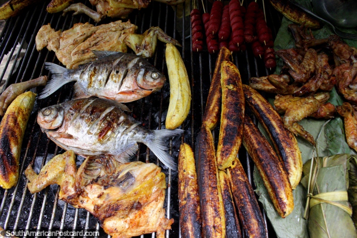 Barbecued fish, chicken and banana cooked by locals at Catarata Santa Carmen in Tingo Maria. (720x480px). Peru, South America.