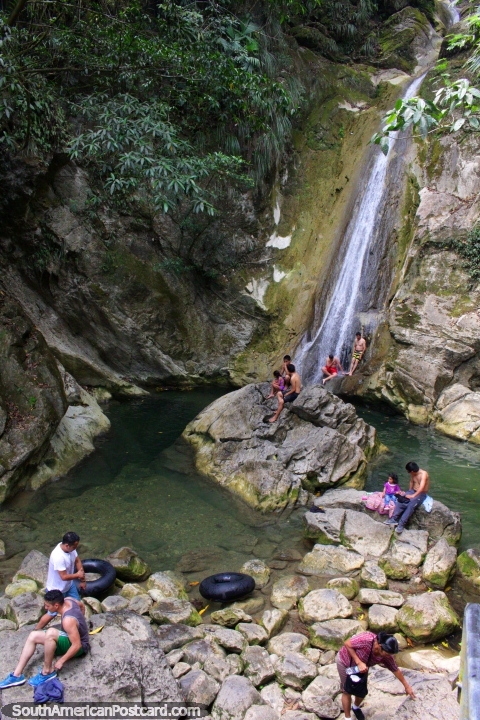 Waterfalls at Santa Carmen, popular place to swim and play, Tingo Maria. (480x720px). Peru, South America.