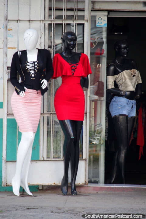 3 mannequins in stunning outfits, fashion in the jungle, Tingo Maria. (480x720px). Peru, South America.