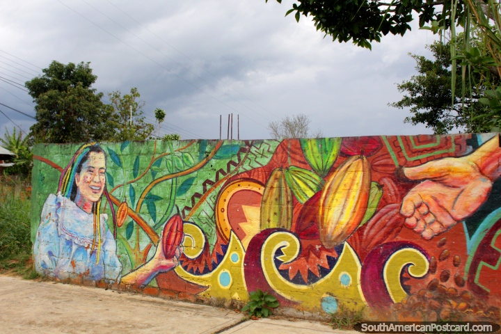 Hand reaches out for fruit from the fruit lady, mural in Lamas. (720x480px). Peru, South America.