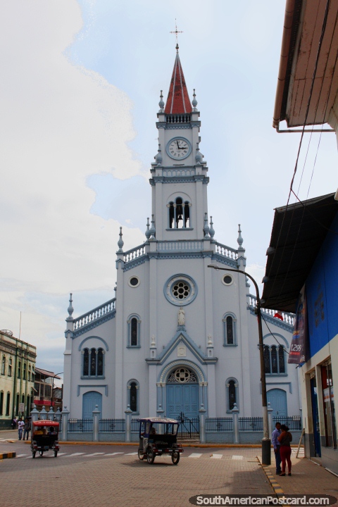 The church with bell-tower and clock in Yurimaguas. (480x720px). Peru, South America.