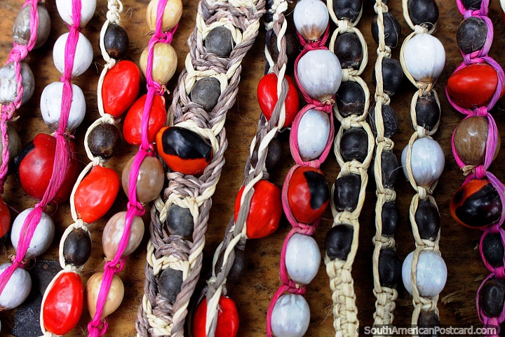 Seeds and beads of color, indigenous Amazon crafts from Iquitos. (720x480px). Peru, South America.