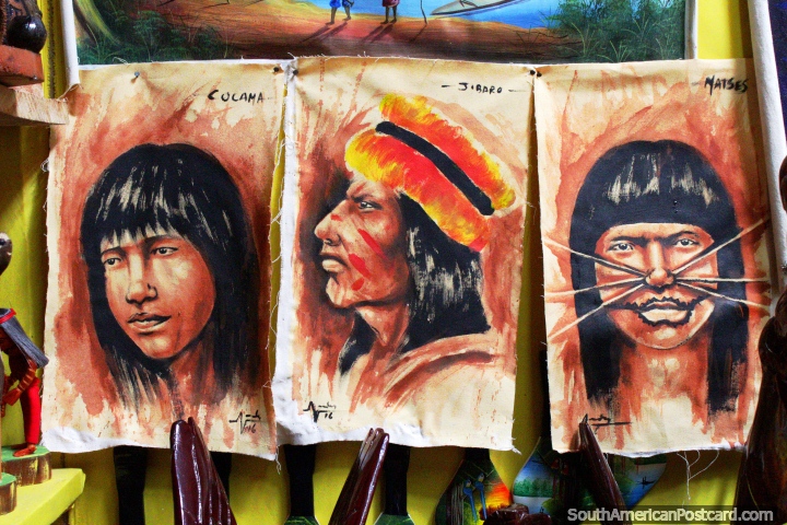 Paintings of indigenous of the Amazon onto cloth, for sale at the Anaconda Arts Center in Iquitos. (720x480px). Peru, South America.