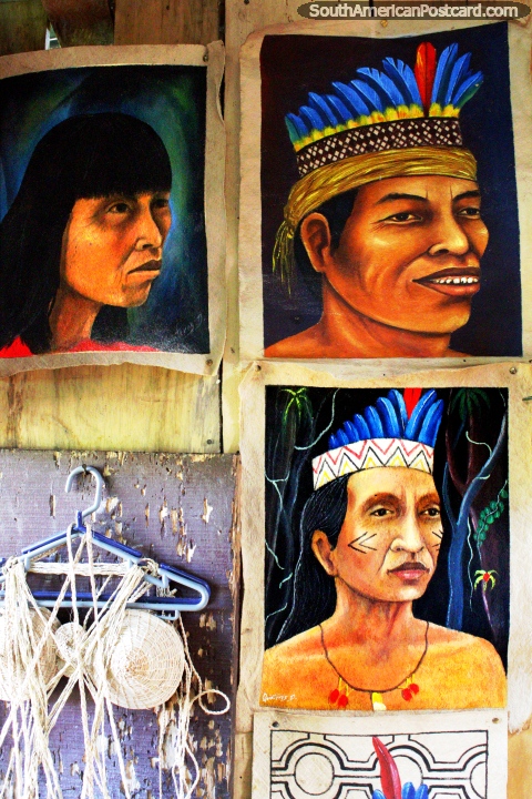 Paintings of the indigenous of the Amazon with blue feathers, Anaconda Arts Center, Iquitos. (480x720px). Peru, South America.