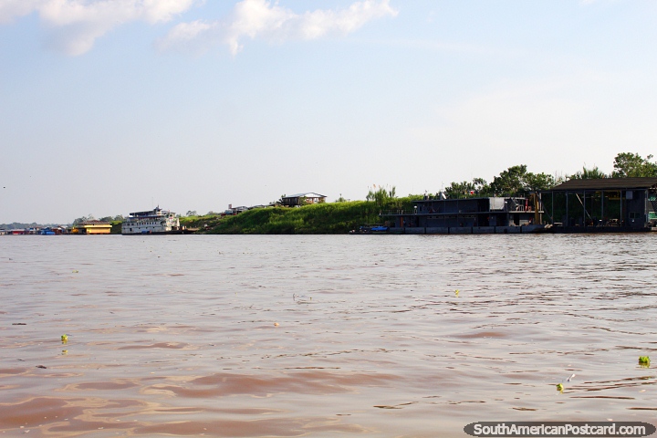 Santa Rosa en la distancia despus de 9 horas en barco en el Ro Amazonas de Iquitos! (720x480px). Per, Sudamerica.