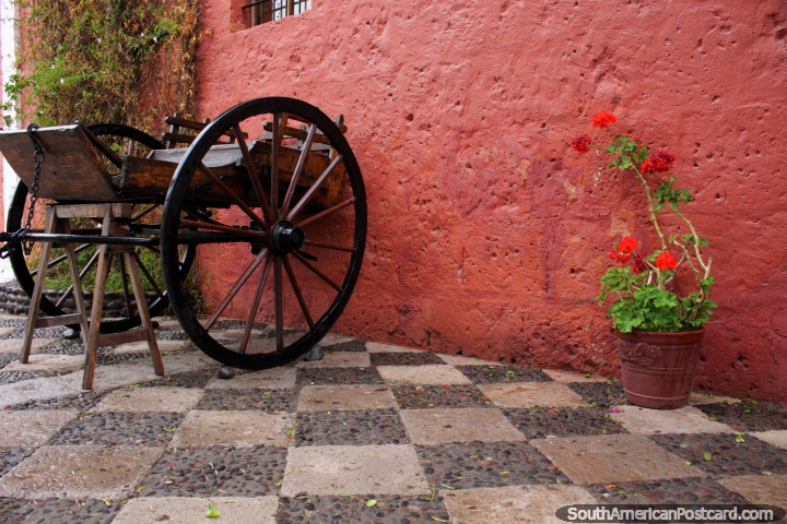 Antique wooden cart on a checkered patio at the mansion of the founder of Arequipa. (720x480px). Peru, South America.