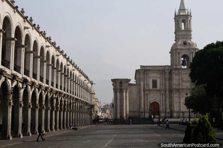 Spectacular arches and the cathedral at the Plaza de Armas in Arequipa, a beautiful plaza. (720x480px). Peru, South America.