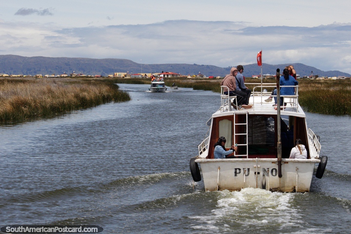 Tours from Puno will take you out onto the lake for a great journey. (720x480px). Peru, South America.