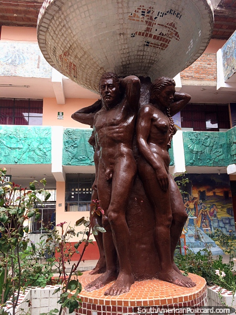 A fountain held up by naked statues located at a school in Puno. (480x640px). Peru, South America.