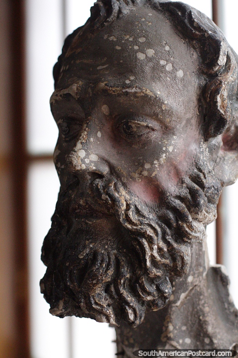Head of a man inside the colonial room, ceramic or bronze, Carlos Dreyer Museum, Puno. (480x720px). Peru, South America.