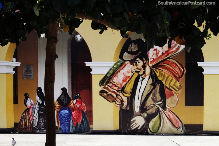 Cultural area in central Lima with large painted works around yellow archways. (720x480px). Peru, South America.