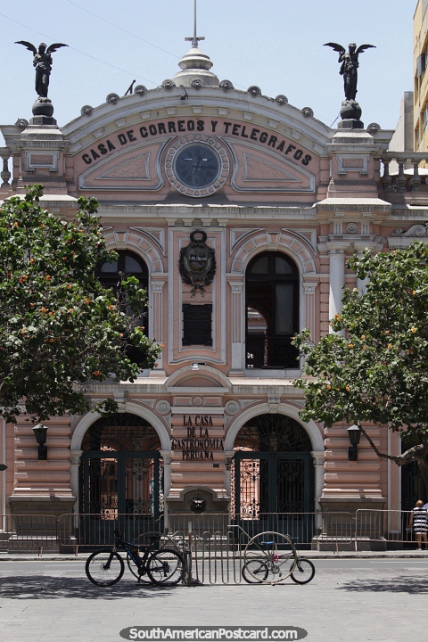 Old mail and telegraph building in Lima, how many pairs of things can you see? (480x720px). Peru, South America.