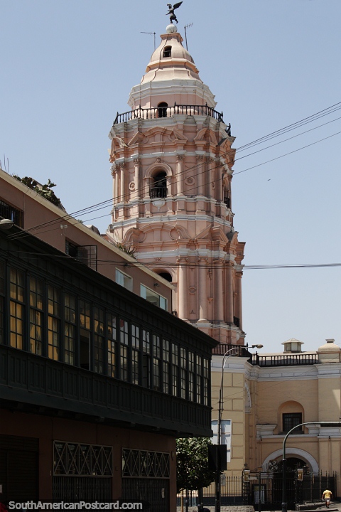 Santo Domingo Convent (1766) with pink tower in Lima, rococo and mudejar style. (480x720px). Peru, South America.