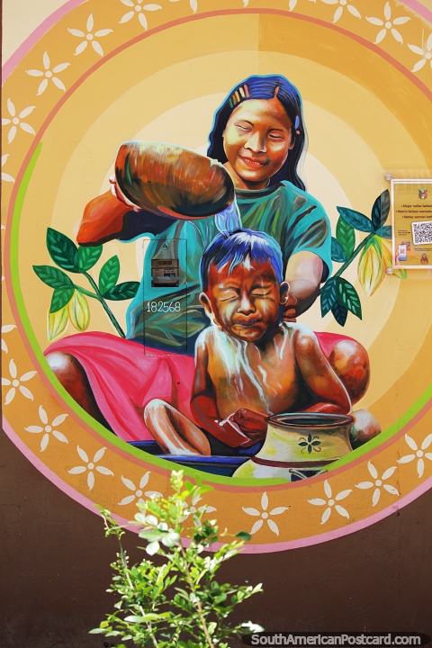 Mujer nativa baando a su hijo, mural cultural en Lamas. (480x720px). Per, Sudamerica.