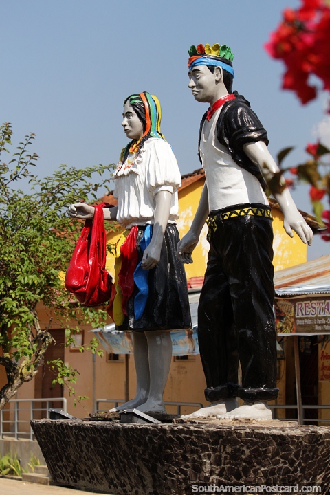At Wayku plaza see the monuments of the local people in colorful dress, Lamas. (480x720px). Peru, South America.