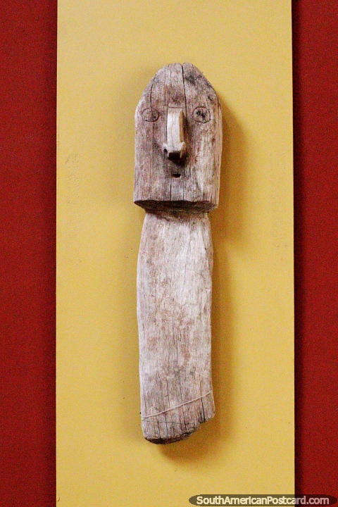 Piece of wood with a face, ruins of furniture, Leymebamba museum. (480x720px). Peru, South America.