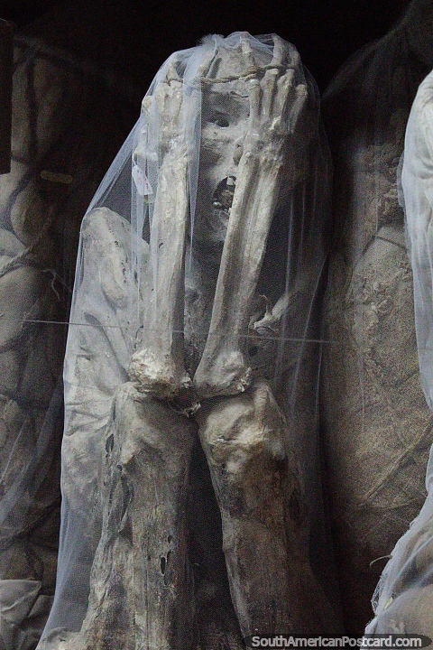 Mummies at Leymebamba museum, with expressions of horror and grief on their faces. (480x720px). Peru, South America.