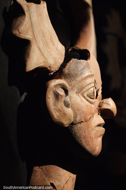 Ceramic mask under nice light, the Moche culture, Sipan museum, Lambayeque. (480x720px). Peru, South America.